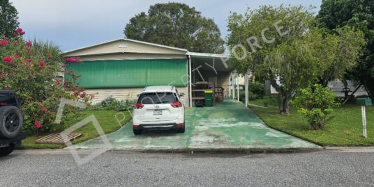 1002 ROBIN DR, BAREFOOT BAY FL 32976